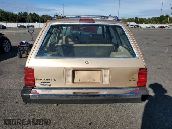 ✅ 1986 Ford Escort • VIN: 1FABP3495GW365298 • Лот: 72817134. Опубликован ранее на Copart с пробегом 65 177 миль. Бесплатный доступ к архиву аукционных продаж из США и подробный отчёт об истории автомобиля на DreamBid. Изображение 6.