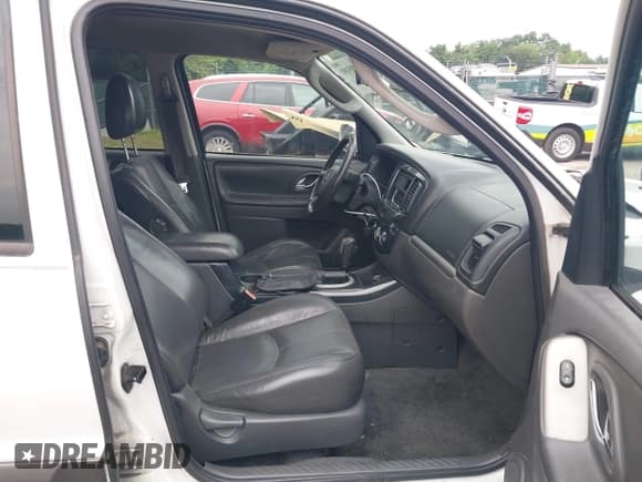 ✅ 2005 Mazda Tribute i • VIN: 4F2YZ92Z75KM42150 • Lot: 42703391. Listed on IAAI with 187,595 mi. Free auction sales archive from the USA and detailed vehicle history report at DreamBid. Image 5.