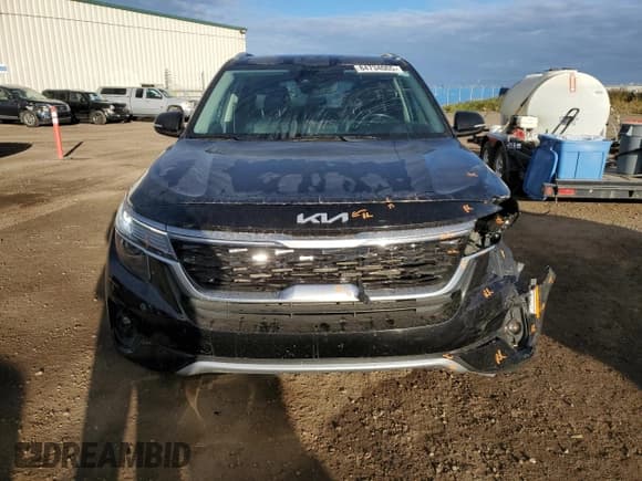 ✅ 2023 Kia Seltos S • VIN: KNDEU2AA3P7411956 • Лот: 84734065. Опубликован ранее на Copart с пробегом 77 568 миль. Бесплатный доступ к архиву аукционных продаж из США и подробный отчёт об истории автомобиля на DreamBid. Изображение 5.