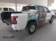 ✅ 2025 Nissan Frontier S • VIN: 1N6ED1EKXSN601669 • Lot: 42171057. Listed on IAAI with 801 mi. Free auction sales archive from the USA and detailed vehicle history report at DreamBid. Image 4.
