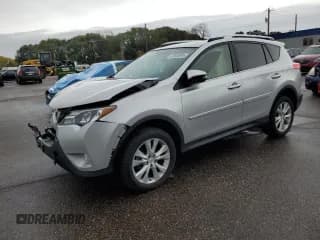 ✅ 2014 Toyota RAV4 Limited • VIN: JTMDFREV7EJ012270 • Lot: 82600985. Listed on Copart with 89,698 mi. Free auction sales archive from the USA and detailed vehicle history report at DreamBid. Image 1.