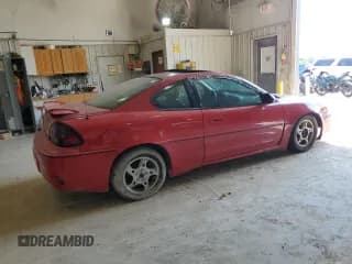 ✅ 2003 Pontiac Grand Am GT • VIN: 1G2NW12E43C103139 • Lot: 62676404. Wystawiony na Copart z przebiegiem 157 043 mil. Bezpłatny archiwum sprzedaży aukcyjnych z USA i szczegółowy raport historii pojazdu na DreamBid. Zdjęcie 3.