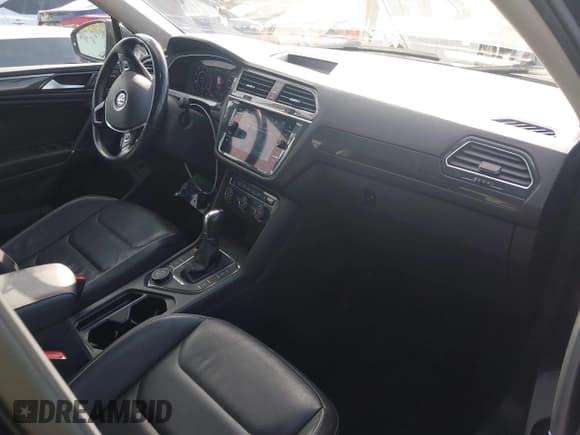 ✅ 2018 Volkswagen Tiguan SEL Premium • VIN: 3VV4B7AX9JM207731 • Лот: 43657756. Опубликован ранее на IAAI с пробегом 78 401 миль. Бесплатный доступ к архиву аукционных продаж из США и подробный отчёт об истории автомобиля на DreamBid. Изображение 5.