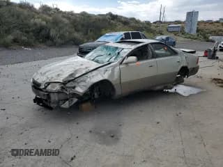 ✅ 1997 Lexus ES 300 • VIN: JT8BF22G8V0052690 • Лот: 71077005. Опубликован ранее на Copart с пробегом Не указан. Бесплатный доступ к архиву аукционных продаж из США и подробный отчёт об истории автомобиля на DreamBid. Изображение 1.