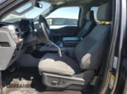 ✅ 2022 Ford F-150 Lightning Pro • VIN: 1FT6W1EV4NWG05226 • Лот: 67845765. Опубликован ранее на Copart с пробегом 15 677 миль. Бесплатный доступ к архиву аукционных продаж из США и подробный отчёт об истории автомобиля на DreamBid. Изображение 7.