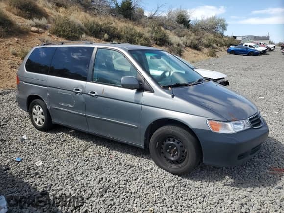 ✅ 2002 Honda Odyssey EX • VIN: 5FNRL18692B020653 • Lot: 69506105. Listed on Copart with 245,074 mi. Free auction sales archive from the USA and detailed vehicle history report at DreamBid. Image 4.