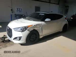 2013 Hyundai Veloster Turbo z VIN KMHTC6AE0DU106928, wystawiony jako Copart lot #81254145 z przebiegiem 135 523 mil mil oraz Szkoda całkowita • Salvage title. Historia ofert i sprzedaży dostępna na DreamBid. Obrazek 1.