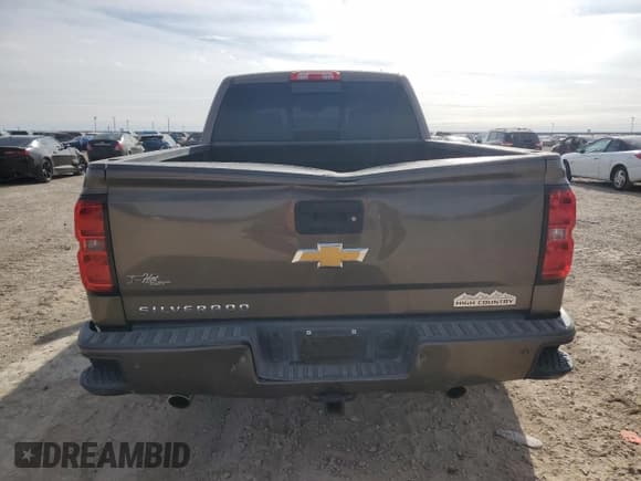 ✅ 2014 Chevrolet Silverado 1500 High Country • VIN: 3GCUKTEC0EG394943 • Лот: 87604505. Опубликован ранее на Copart с пробегом 123 650 миль. Бесплатный доступ к архиву аукционных продаж из США и подробный отчёт об истории автомобиля на DreamBid. Изображение 6.