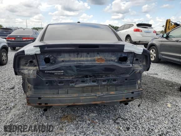 2012 Dodge Charger SXT Plus с VIN 2C3CDXJGXCH161644, выставлен на аукционе Copart как лот 69469145 с пробегом 181 013 миль миль и Списание • Salvage title. История ставок и продаж доступна на DreamBid. Изображение 6.