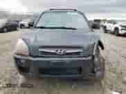 2009 Hyundai Tucson SE z VIN KM8JN72D49U975875, wystawiony jako Copart lot #76923954 z przebiegiem 167 155 mil mil oraz Szkoda całkowita • Salvage title. Historia ofert i sprzedaży dostępna na DreamBid. Obrazek 5.