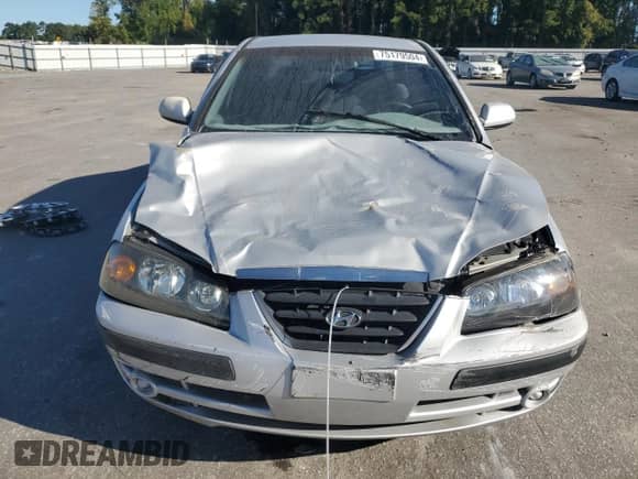 2005 Hyundai Elantra GLS z VIN KMHDN46D35U984289, wystawiony jako Copart lot #75179504 z przebiegiem 259 838 mil mil oraz Szkoda całkowita • Salvage title. Historia ofert i sprzedaży dostępna na DreamBid. Obrazek 5.