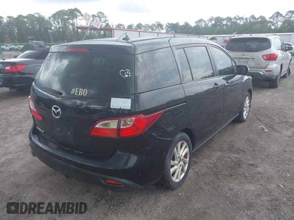 ✅ 2013 Mazda 5 Sport • VIN: JM1CW2BL8D0145422 • Lot: 42823178. Listed on IAAI with 161,899 mi. Free auction sales archive from the USA and detailed vehicle history report at DreamBid. Image 4.