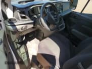 ✅ 2024 Ford Transit Cargo • VIN: 1FTBR1Y81RKA00248 • Lot: 86586805. Wystawiony na Copart z przebiegiem 15 243 mil. Bezpłatny archiwum sprzedaży aukcyjnych z USA i szczegółowy raport historii pojazdu na DreamBid. Zdjęcie 8.