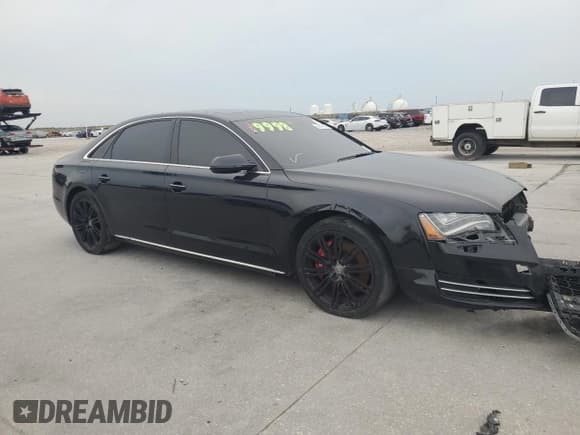 ✅ 2012 Audi A8 • VIN: WAURVAFD2CN005214 • Lot: 66513975. Listed on Copart with 136,915 mi. Free auction sales archive from the USA and detailed vehicle history report at DreamBid. Image 4.
