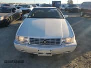 ✅ 2002 Cadillac Eldorado ESC • VIN: 1G6EL12Y12B100821 • Лот: 83495214. Опубликован ранее на Copart с пробегом 36 358 миль. Бесплатный доступ к архиву аукционных продаж из США и подробный отчёт об истории автомобиля на DreamBid. Изображение 5.