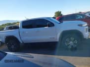 ✅ 2024 GMC Canyon 4WD AT4 • VIN: 1GTP6DEK1R1144016 • Lot: 43282257. Listed on IAAI with 18,298 mi. Free auction sales archive from the USA and detailed vehicle history report at DreamBid. Image 13.