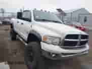 2004 Dodge 3500 ST with VIN 3D7LU38C64G117736, listed as a IAAI auction lot 42058492 with 229,102 mi miles and . Bid and sale history available at DreamBid. Image 1.