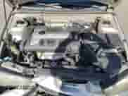 2003 Hyundai Elantra GLS z VIN KMHDN45D33U629413, wystawiony jako Copart lot #78414854 z przebiegiem 195 266 mil mil oraz Szkoda całkowita • Salvage title. Historia ofert i sprzedaży dostępna na DreamBid. Obrazek 11.