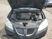 ✅ 2009 Pontiac G6 1SA • VIN: 1G2ZG57N594128441 • Lot: 60899965. Wystawiony na Copart z przebiegiem 339 536 mil. Bezpłatny archiwum sprzedaży aukcyjnych z USA i szczegółowy raport historii pojazdu na DreamBid. Zdjęcie 11.