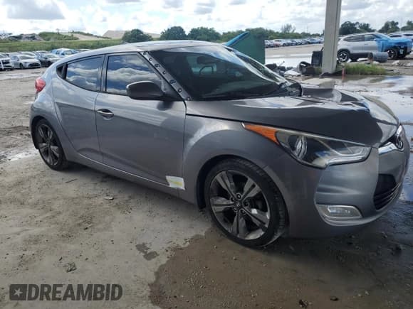 ✅ 2016 Hyundai Veloster • VIN: KMHTC6AD5GU255170 • Lot: 76111294. Wystawiony na Copart z przebiegiem 77 026 mil. Bezpłatny archiwum sprzedaży aukcyjnych z USA i szczegółowy raport historii pojazdu na DreamBid. Zdjęcie 4.