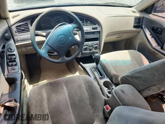 ✅ 2001 Hyundai Elantra GLS • VIN: KMHDN45D61U132398 • Lot: 61164165. Wystawiony na Copart z przebiegiem 162 729 mil. Bezpłatny archiwum sprzedaży aukcyjnych z USA i szczegółowy raport historii pojazdu na DreamBid. Zdjęcie 8.