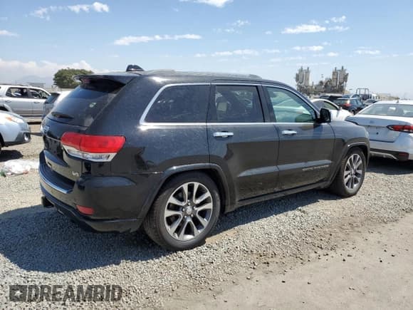 ✅ 2018 Jeep Grand Cherokee High Altitude • VIN: 1C4RJFCGXJC189482 • Лот: 70001425. Опубликован ранее на Copart с пробегом 115 787 миль. Бесплатный доступ к архиву аукционных продаж из США и подробный отчёт об истории автомобиля на DreamBid. Изображение 3.