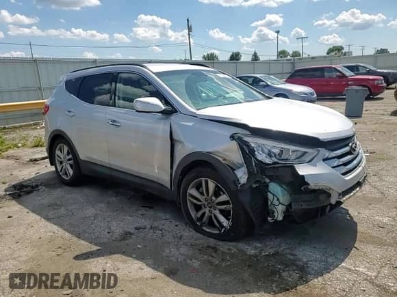 2014 Hyundai Santa Fe с VIN 5XYZU3LAXEG206428, выставлен на аукционе Copart как лот 71009555 с пробегом 56 183 миль миль и На запчасти • Non repairable. История ставок и продаж доступна на DreamBid. Изображение 14.