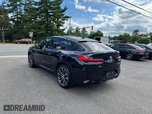 ✅ 2022 BMW X4 M40i • VIN: 5UX43DT01N9J61857 • Lot: 66967615. Listed on Copart with 106,024 mi. Free auction sales archive from the USA and detailed vehicle history report at DreamBid. Image 4.