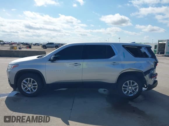✅ 2020 Chevrolet Traverse LS • VIN: 1GNERFKW1LJ250465 • Lot: 43244251. Listed on IAAI with 124,464 mi. Free auction sales archive from the USA and detailed vehicle history report at DreamBid. Image 15.