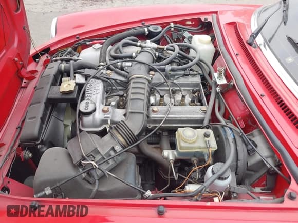 ✅ 1986 Alfa Romeo Spider Veloce • VIN: ZARBA5418G1040472 • Lot: 42551536. Listed on IAAI with 99,614 mi. Free auction sales archive from the USA and detailed vehicle history report at DreamBid. Image 10.