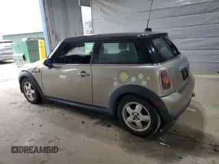 2010 MINI Hardtop with VIN WMWMF3C50ATZ66791, listed as a Copart auction lot 57592875 with Not provided miles and Salvage title. Bid and sale history available at DreamBid. Image 2.