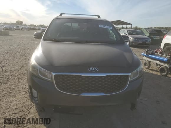 ✅ 2015 Kia Sedona SX • VIN: KNDMC5C18F6051049 • Лот: 82643125. Опубликован ранее на Copart с пробегом 242 183 миль. Бесплатный доступ к архиву аукционных продаж из США и подробный отчёт об истории автомобиля на DreamBid. Изображение 5.
