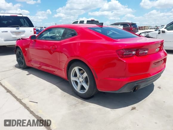✅ 2022 Chevrolet Camaro 1LT • VIN: 1G1FB1RX9N0112791 • Lot: 42204932. Listed on IAAI with 69,679 mi. Free auction sales archive from the USA and detailed vehicle history report at DreamBid. Image 3.