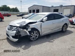 ✅ 2012 Hyundai Azera • VIN: KMHFG4JG1CA140299 • Лот: 69421955. Опубликован ранее на Copart с пробегом 91 285 миль. Бесплатный доступ к архиву аукционных продаж из США и подробный отчёт об истории автомобиля на DreamBid. Изображение 1.