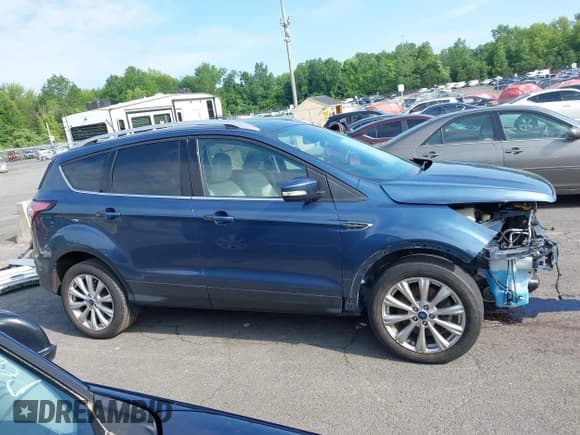 ✅ 2018 Ford Escape Titanium • VIN: 1FMCU9J92JUB01162 • Lot: 42495112. Listed on IAAI with 96,280 mi. Free auction sales archive from the USA and detailed vehicle history report at DreamBid. Image 14.
