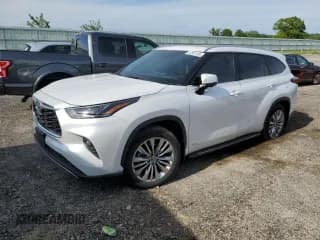 ✅ 2023 Toyota Highlander Hybrid Platinum • VIN: 5TDEBRCH3PS591759 • Lot: 57351165. Listed on Copart with 22,482 mi. Free auction sales archive from the USA and detailed vehicle history report at DreamBid. Image 1.