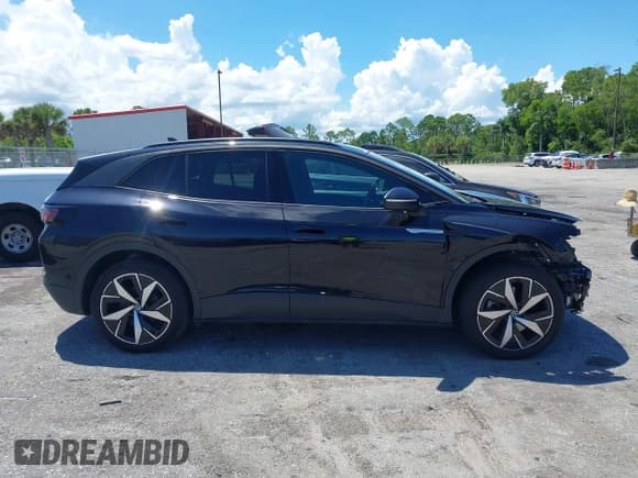 ✅ 2023 Volkswagen ID.4 Pro S • VIN: 1V2WNPE83PC025727 • Lot: 43012133. Wystawiony na IAAI z przebiegiem 28 057 mil. Bezpłatny archiwum sprzedaży aukcyjnych z USA i szczegółowy raport historii pojazdu na DreamBid. Zdjęcie 14.