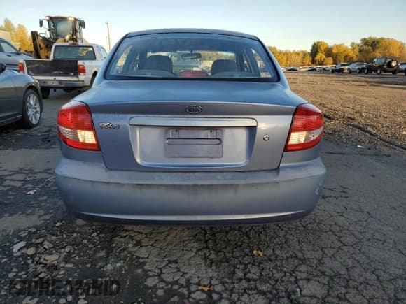 ✅ 2004 Kia Rio • VIN: KNADC125946336107 • Лот: 79957854. Опубликован ранее на Copart с пробегом 201 254 миль. Бесплатный доступ к архиву аукционных продаж из США и подробный отчёт об истории автомобиля на DreamBid. Изображение 6.