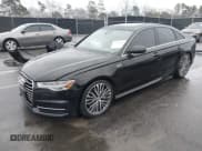 ✅ 2016 Audi A6 Prestige • VIN: WAUHGAFC9GN016715 • Lot: 41624521. Listed on IAAI with 139,402 mi. Free auction sales archive from the USA and detailed vehicle history report at DreamBid. Image 2.