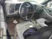 1995 Chevrolet Blazer z VIN 1GNCS13W5S2165022, wystawiony jako Copart lot #58006505 z przebiegiem 318 061 mil mil oraz Szkoda całkowita • Salvage title. Historia ofert i sprzedaży dostępna na DreamBid. Obrazek 8.