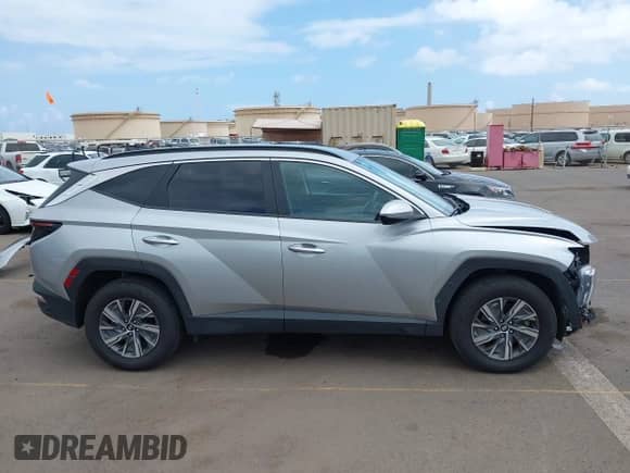 2023 Hyundai Tucson Blue z VIN KM8JBCA16PU097422, wystawiony jako IAAI lot #42138545 z przebiegiem 14 826 mil mil oraz . Historia ofert i sprzedaży dostępna na DreamBid. Obrazek 14.