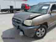 2005 Hyundai Santa Fe GLS z VIN KM8SC73E75U938928, wystawiony jako IAAI lot #42298752 z przebiegiem 147 476 mil mil oraz . Historia ofert i sprzedaży dostępna na DreamBid. Obrazek 6.