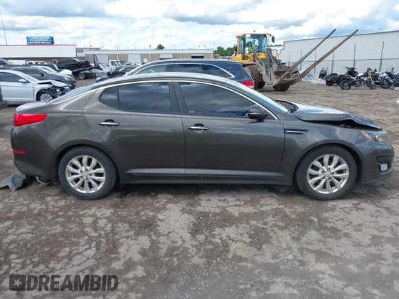 ✅ 2014 Kia Optima LX • VIN: 5XXGM4A78EG329217 • Lot: 42195004. Listed on IAAI with 149,722 mi. Free auction sales archive from the USA and detailed vehicle history report at DreamBid. Image 14.