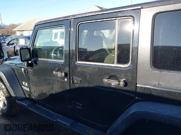✅ 2008 Jeep Wrangler Unlimited X • VIN: 1J4GA39148L640449 • Lot: 41327715. Listed on IAAI with 167,148 mi. Free auction sales archive from the USA and detailed vehicle history report at DreamBid. Image 14.