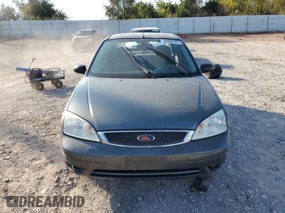 ✅ 2006 Ford Focus S • VIN: 1FAFP34N76W126588 • Lot: 82662405. Listed on Copart with 105,514 mi. Free auction sales archive from the USA and detailed vehicle history report at DreamBid. Image 5.
