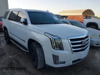 ✅ 2018 Cadillac Escalade Luxury • VIN: 1GYS3BKJ1JR136873 • Lot: 43663003. Listed on IAAI with 104,749 mi. Free auction sales archive from the USA and detailed vehicle history report at DreamBid. Image 1.