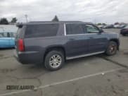 ✅ 2015 Chevrolet Suburban LT • VIN: 1GNSCJKC3FR569739 • Lot: 82291685. Wystawiony na Copart z przebiegiem 176 880 mil. Bezpłatny archiwum sprzedaży aukcyjnych z USA i szczegółowy raport historii pojazdu na DreamBid. Zdjęcie 3.
