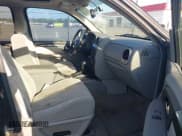 ✅ 2006 GMC Envoy SLT • VIN: 1GKDS13S262197642 • Lot: 42694689. Listed on IAAI with 130,620 mi. Free auction sales archive from the USA and detailed vehicle history report at DreamBid. Image 5.