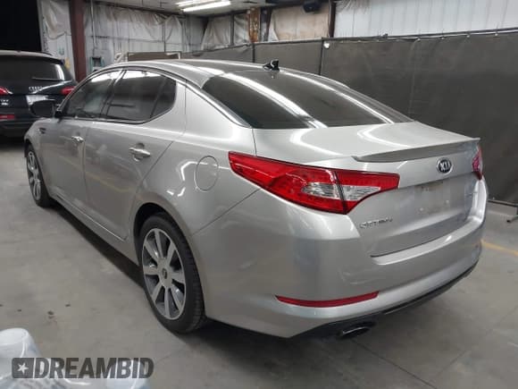 ✅ 2013 Kia Optima SX • VIN: 5XXGR4A6XDG106748 • Lot: 43325773. Listed on IAAI with 67,913 mi. Free auction sales archive from the USA and detailed vehicle history report at DreamBid. Image 3.