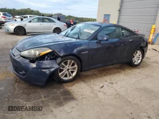 ✅ 2008 Hyundai Tiburon GS • VIN: KMHHM66D88U294638 • Лот: 87246165. Опубликован ранее на Copart с пробегом 166 936 миль. Бесплатный доступ к архиву аукционных продаж из США и подробный отчёт об истории автомобиля на DreamBid. Изображение 1.